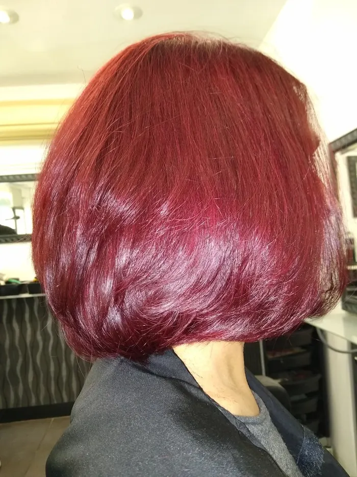Glossy burgundy red bob cut and coloured at Harvey's Hairdressers, Luton