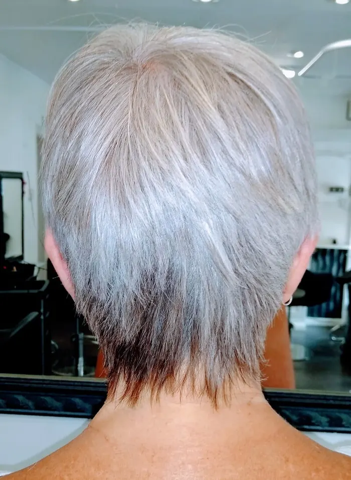 Silver blonde cropped pixie cut styled at Harvey's Hairdressers, Luton